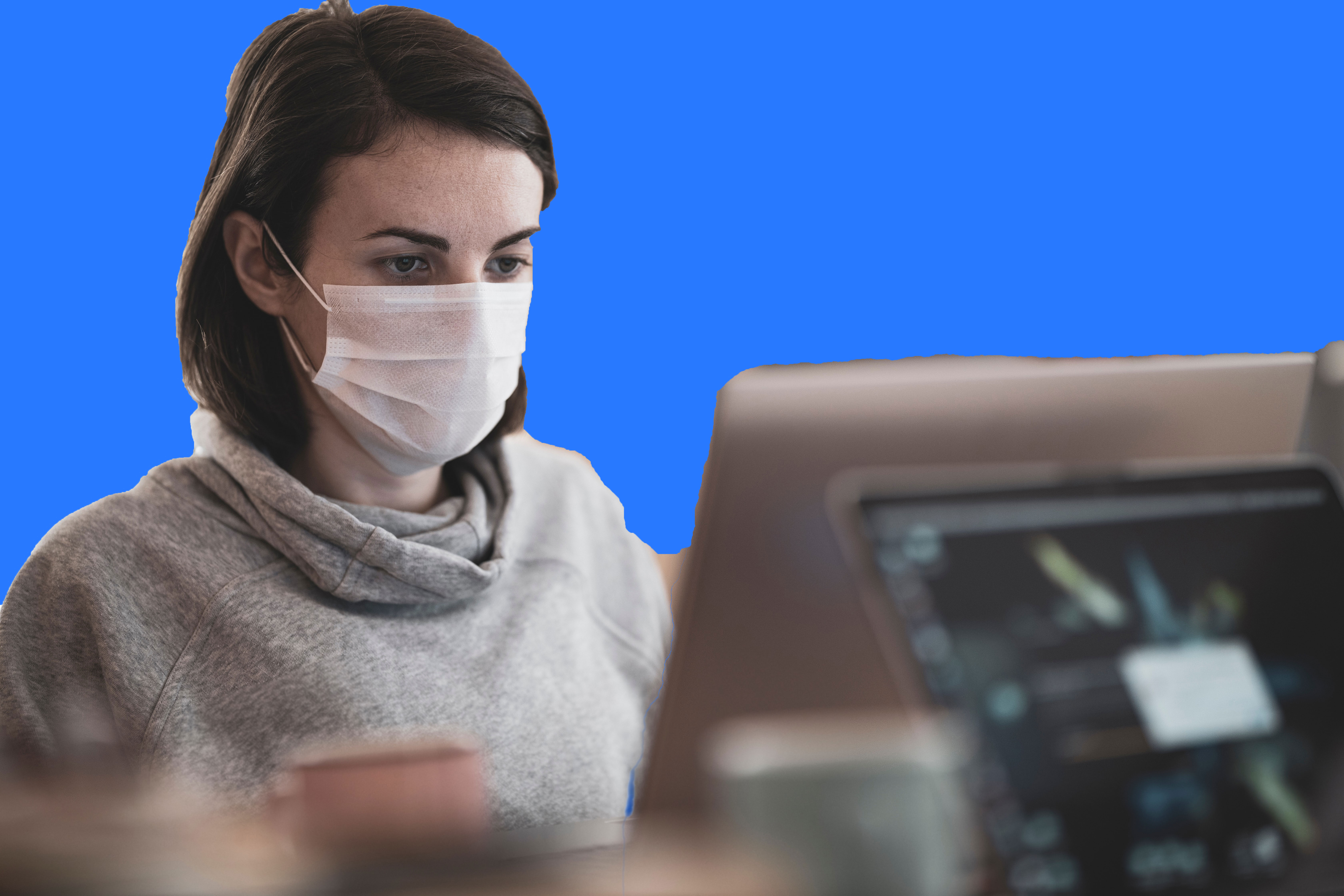 Masked Woman Working Remotely
